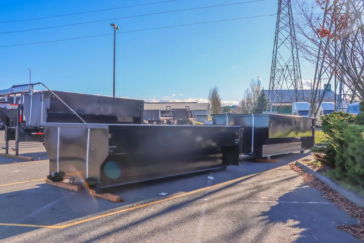 Roll-off dumpster ready for waste disposal at job site for Residential Dumpster Rental in Macon